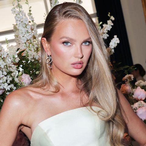 Romee Strijd posing in front of flowers Jacopo Raule/GC Romee Strijd