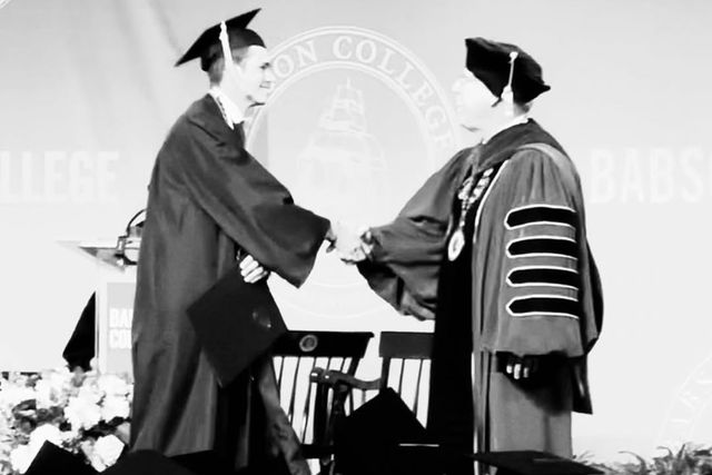 Elle Macpherson's son, Cy Busson, graduating from college Elle Macpherson/Instagram Cy Busson accepting his diploma from Babson College