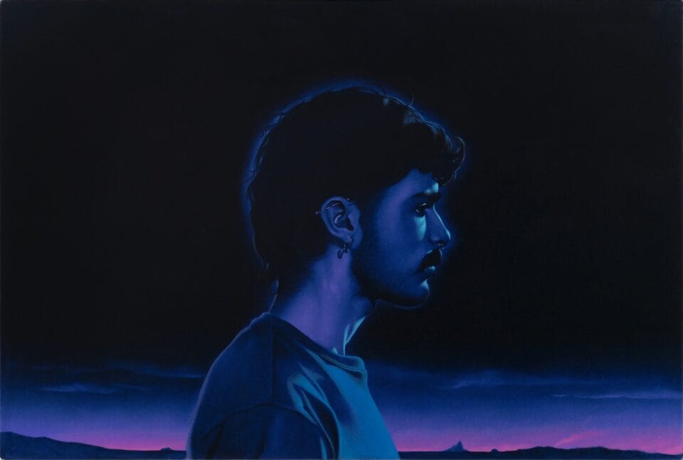 a painting of a male figure standing in profile at night, illuminated blue against a deep pinkish-blue horizon