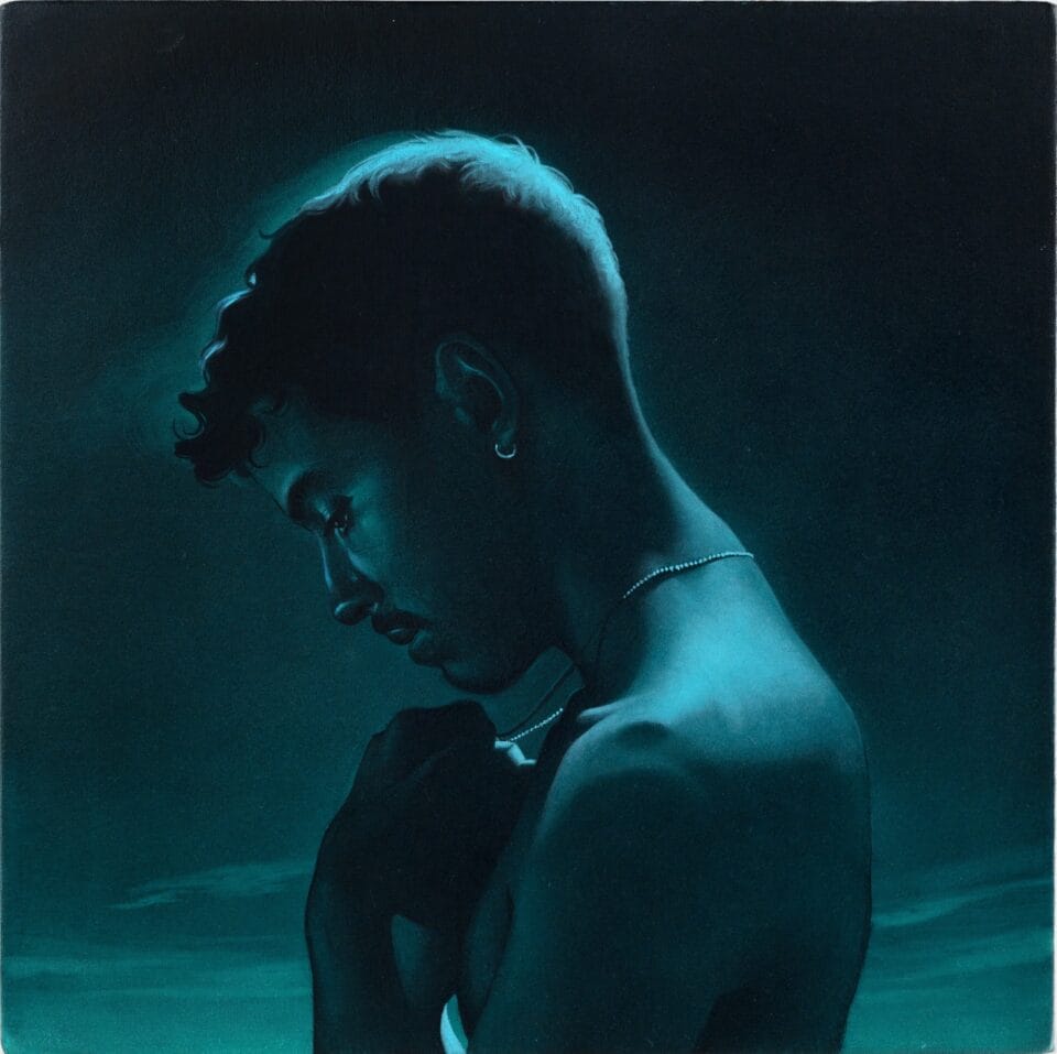 a teal-and-black painting of a male figure in profile with his head bowed down and his hands at his chest